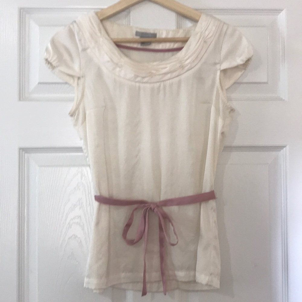 Cream top with pink tie